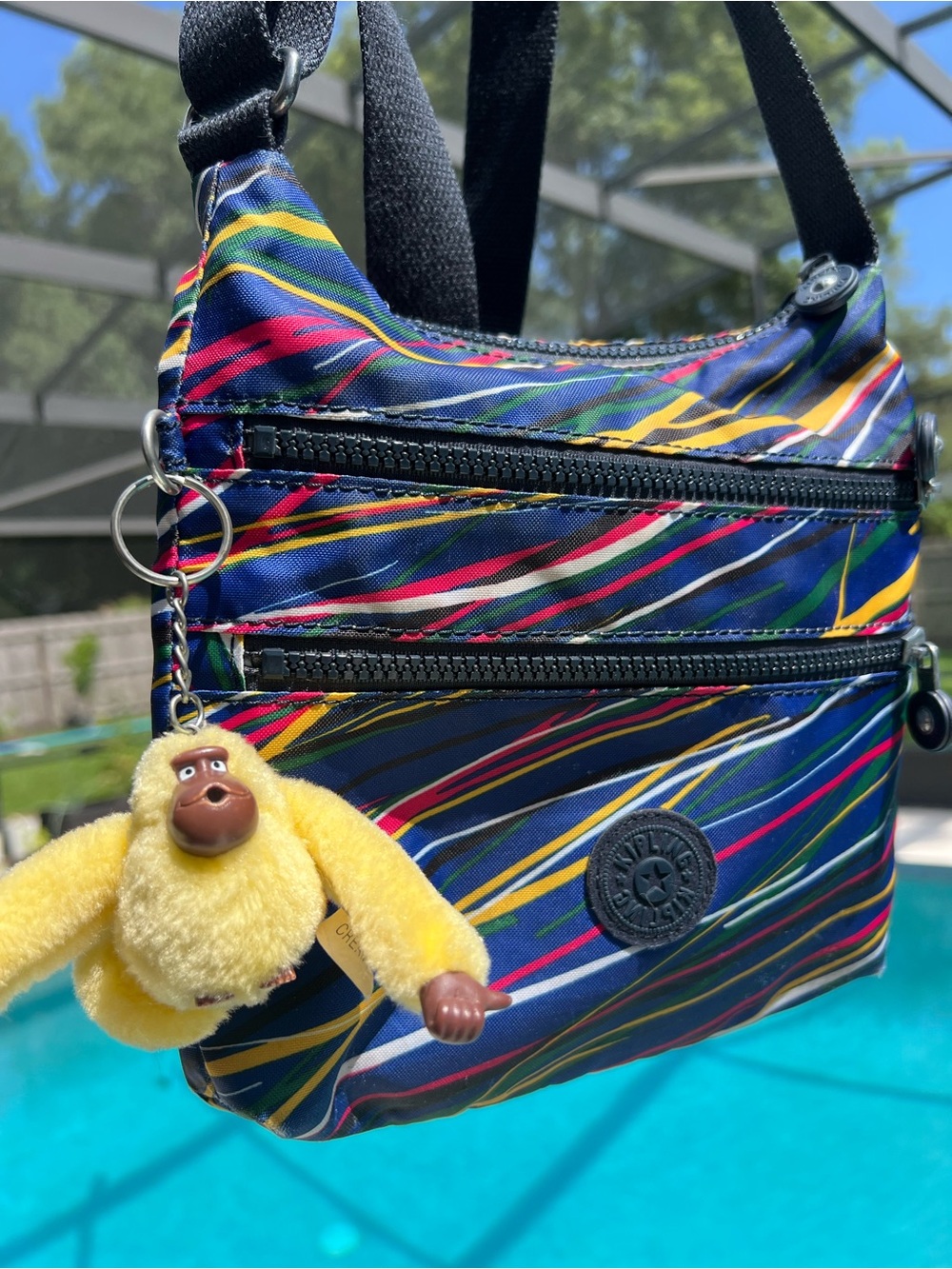 Kipling Navy Multi-Color Crossbody Bag with Yellow Monkey Keychain